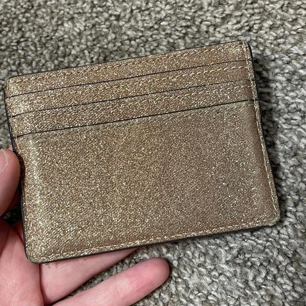 Kate Spade New York gold glitter card holder